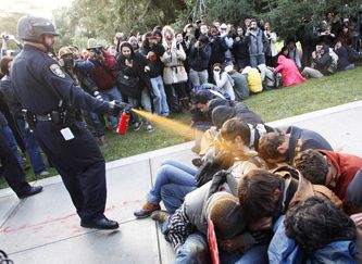 UC DAVIS Police Lt. John Pike pepper sprays peaceful protesters