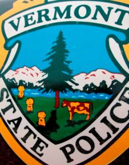 Vermont police car logo contains a pig put there by the prison inmates - The pig is one of the spots on the cow, near the top left of the cow
