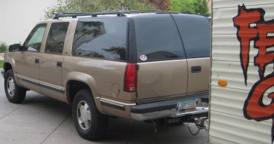 SUV with Arizona License plate ARP3500 towing the Fear God Trailer with Arizona license plate G-27507