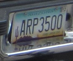 SUV with Arizona License plate ARP3500 towing the Fear God Trailer with Arizona license plate G-27507