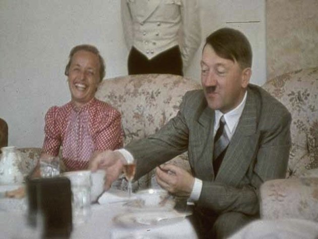 Color photo of mass murderer, war criminal and government tyrant Hitler in his home