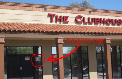 No Guns Allowed sign at the Clubhouse night club on Broadway in Tempe, Arizona where a shootout wounded 15 people
